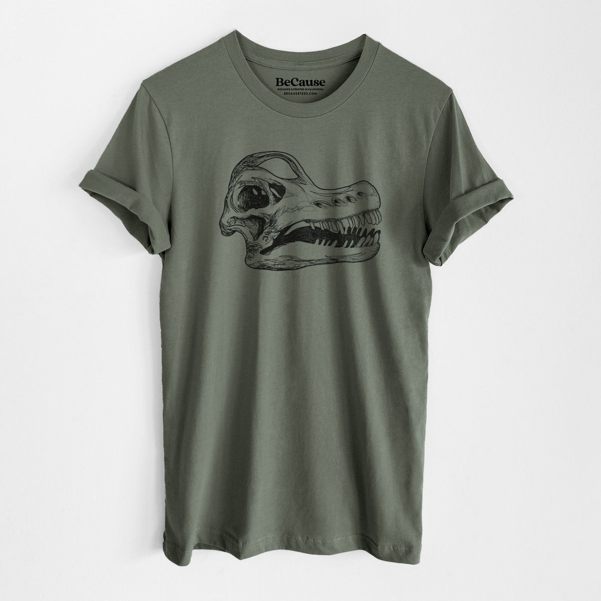 Military green lightweight cotton t-shirt laid flat, printed with a detailed black ink illustration of a Brachiosaurus skull.