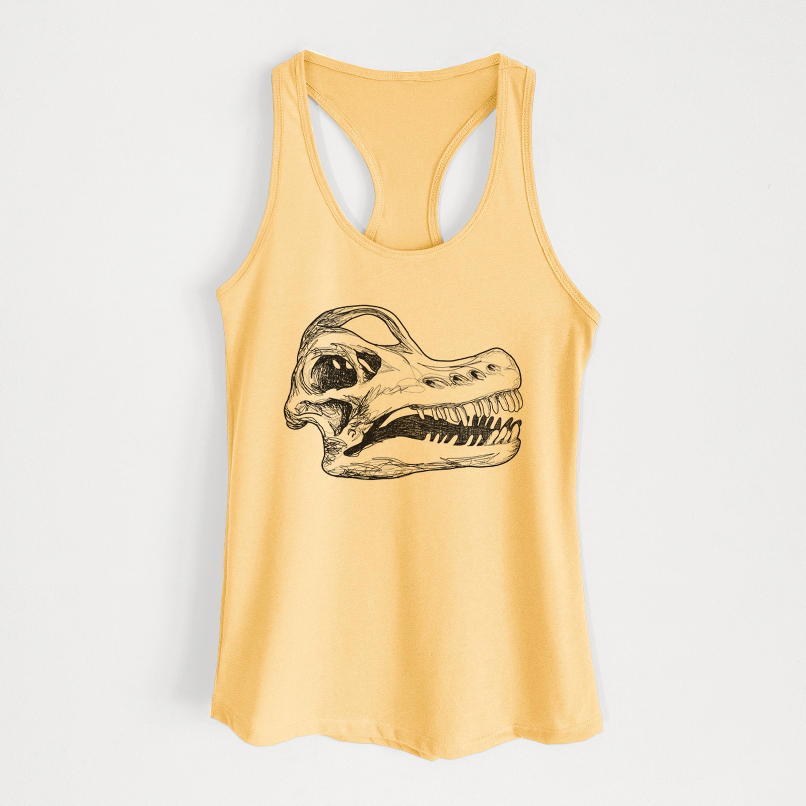 Banana cream women's racerback tank top laid flat, printed with a detailed black ink illustration of a Brachiosaurus skull.