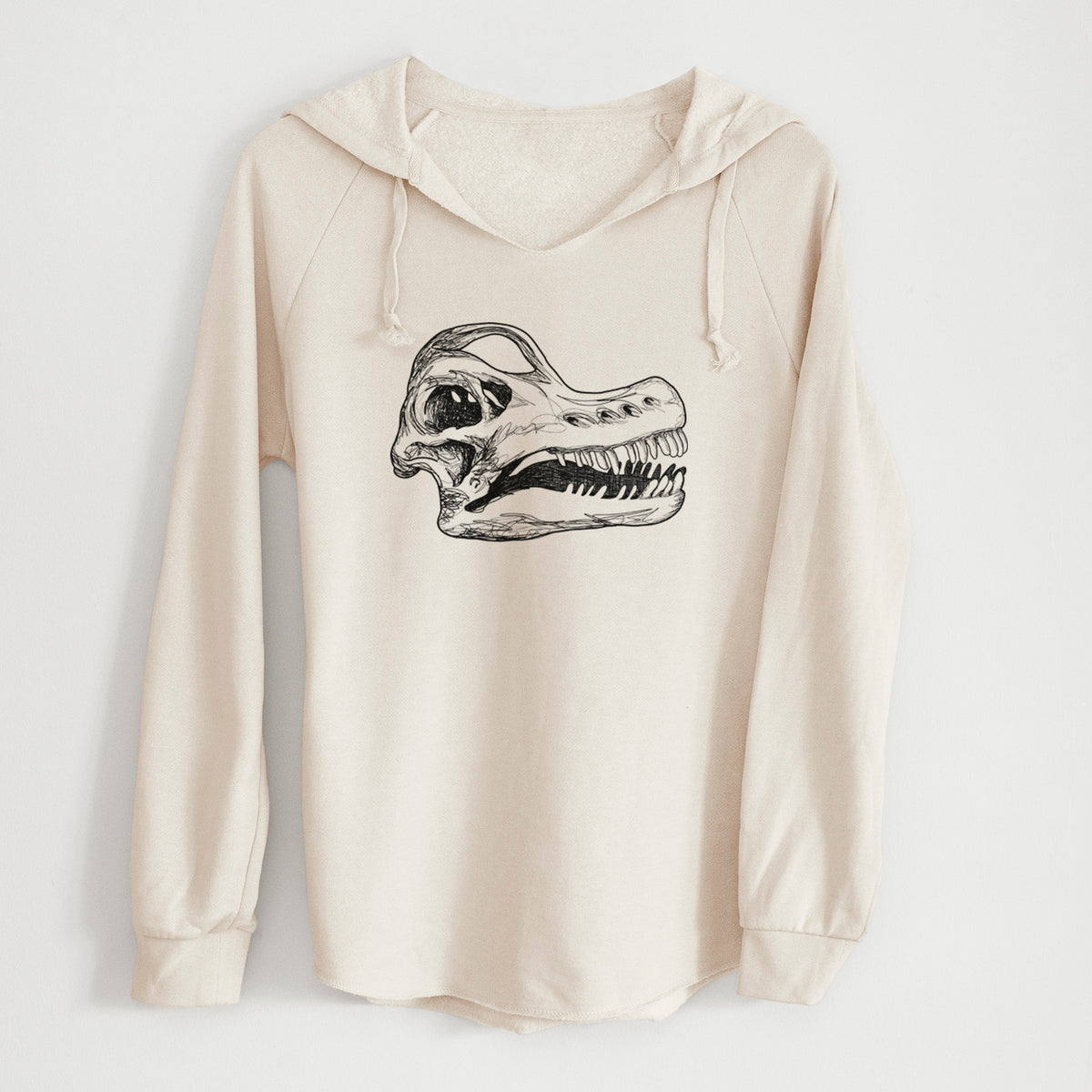 Bone cream women's Cali Wave hooded sweatshirt laid flat, printed with a detailed black ink illustration of a Brachiosaurus skull.
