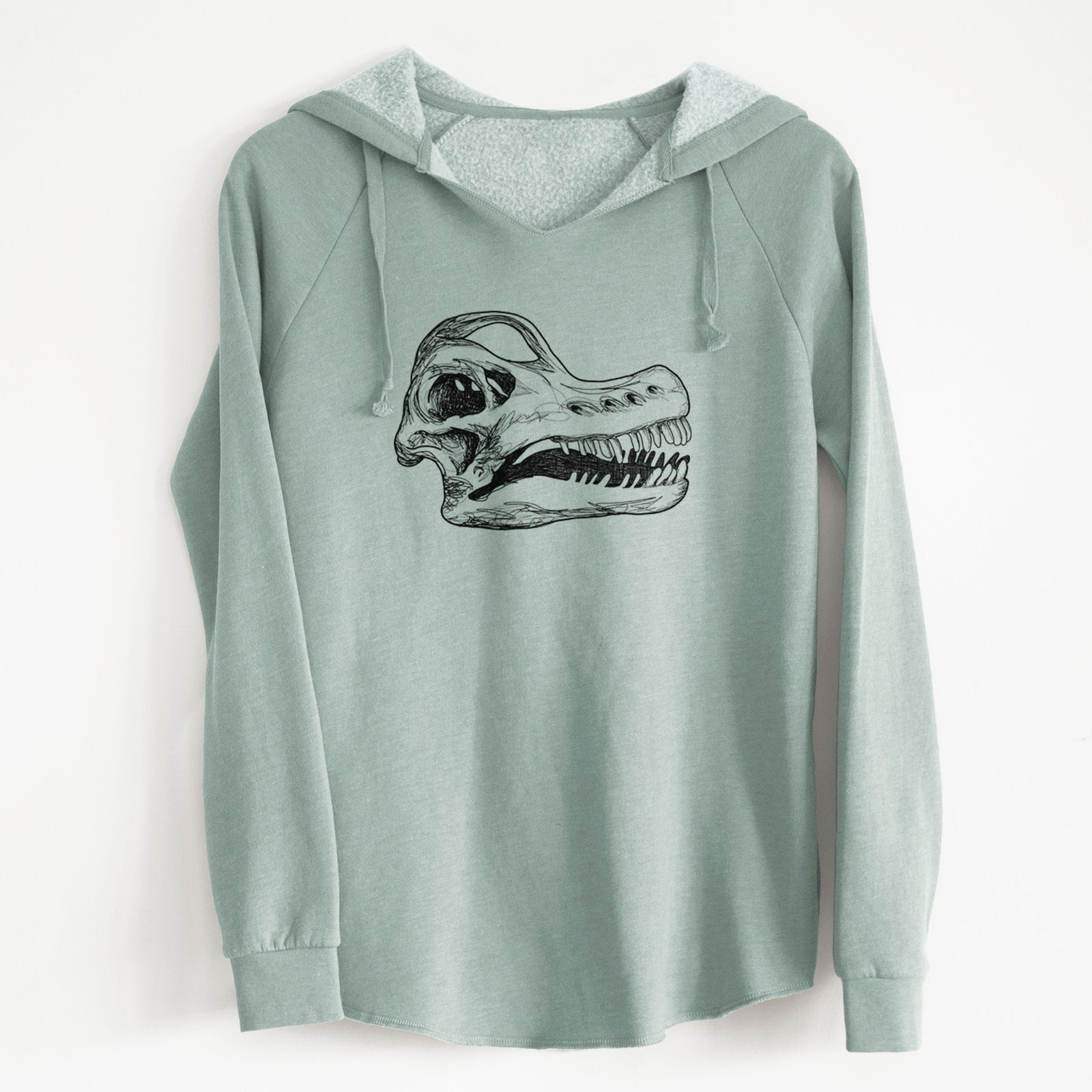 Sage green women's Cali Wave hooded sweatshirt laid flat, printed with a detailed black ink illustration of a Brachiosaurus skull.
