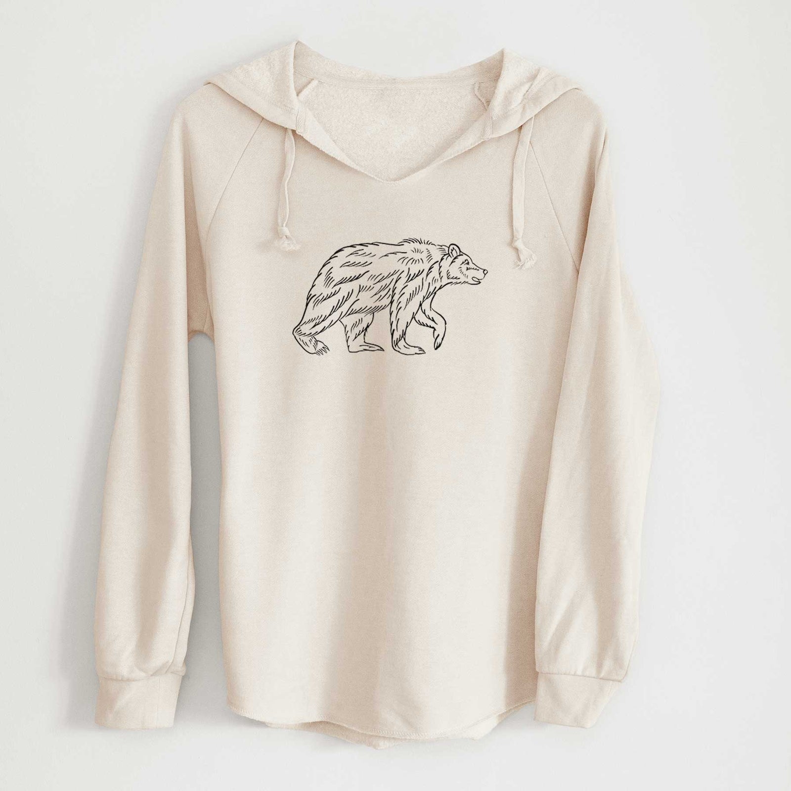 Bone cream women's Cali Wave hooded sweatshirt laid flat, printed with a black ink illustration of a brown bear walking.