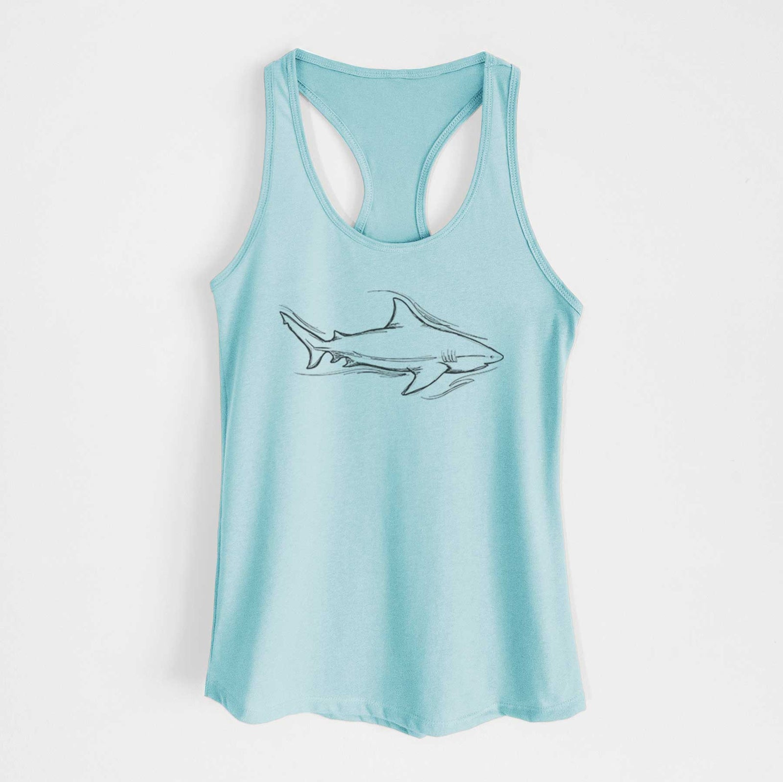 Banana cream women's racerback tank top laid flat, printed with a black ink illustration of a bull shark swimming.