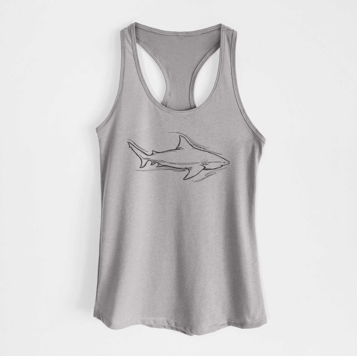 Heather grey women's racerback tank top laid flat, printed with a black ink illustration of a bull shark swimming.