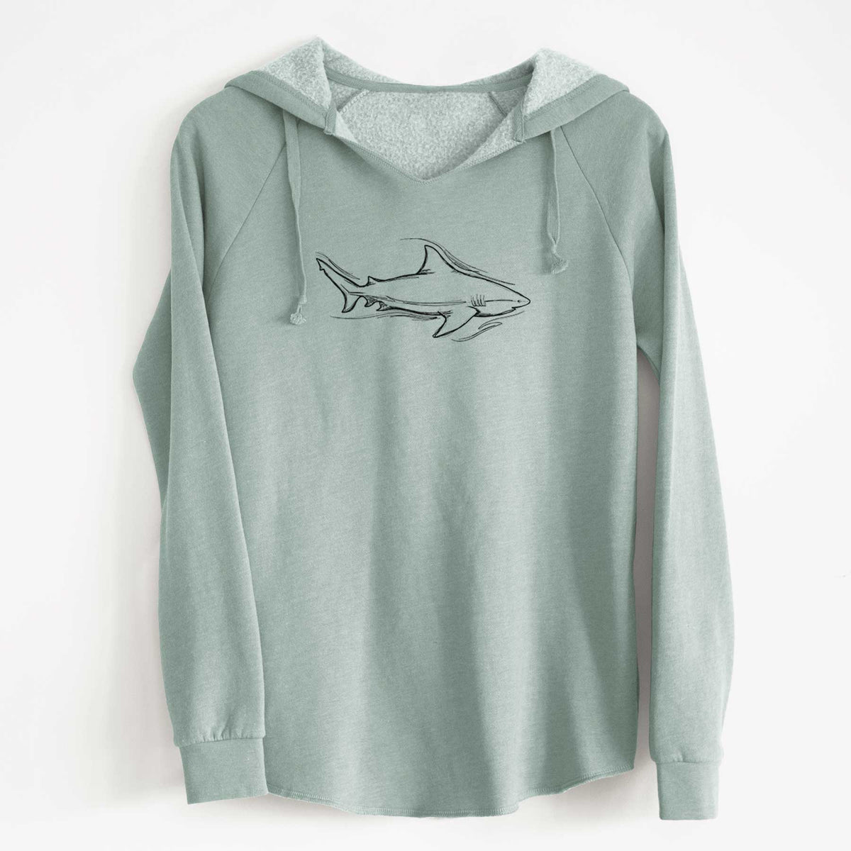 Sage green women's Cali Wave hooded sweatshirt laid flat, printed with a black ink illustration of a bull shark swimming.