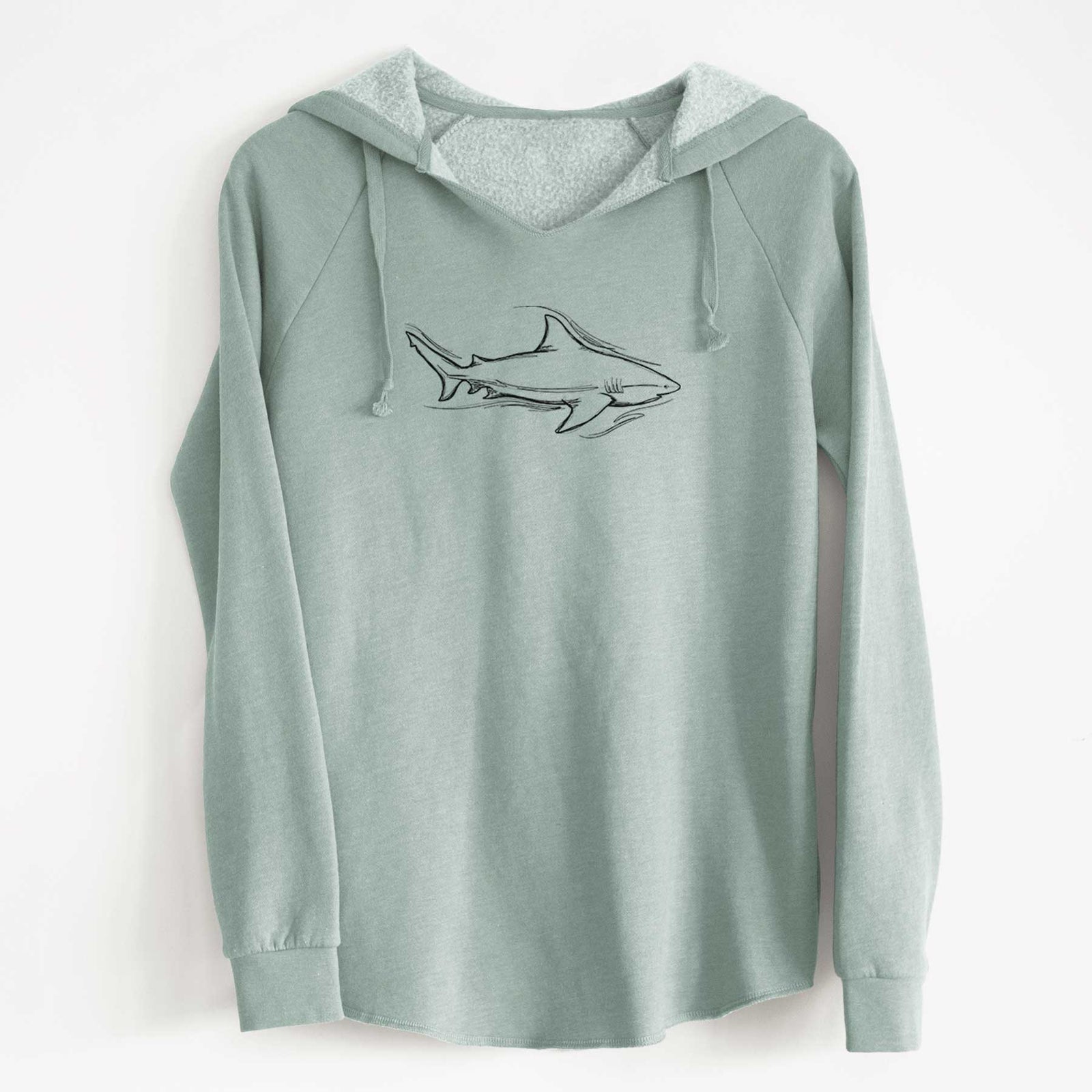 Misty blue women's Cali Wave hooded sweatshirt laid flat, printed with a black ink illustration of a bull shark swimming.