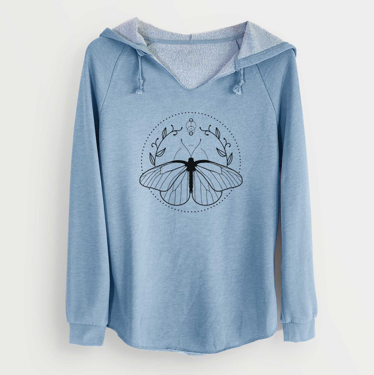 Misty blue women's Cali Wave hooded sweatshirt laid flat, printed with a black ink butterfly inside a circle, framed by moon phases and leaves.