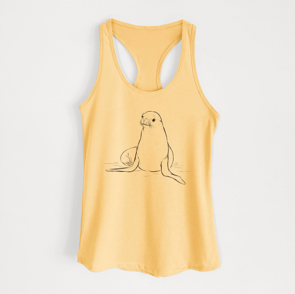 Banana cream women's racerback tank top laid flat, printed with a black ink illustration of a California sea lion sitting upright.