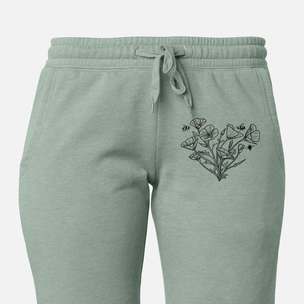 Front of sage green Cali Wave sweatpants, printed with a black ink line drawing of California poppies arranged in a heart shape, with small bees on the leg.