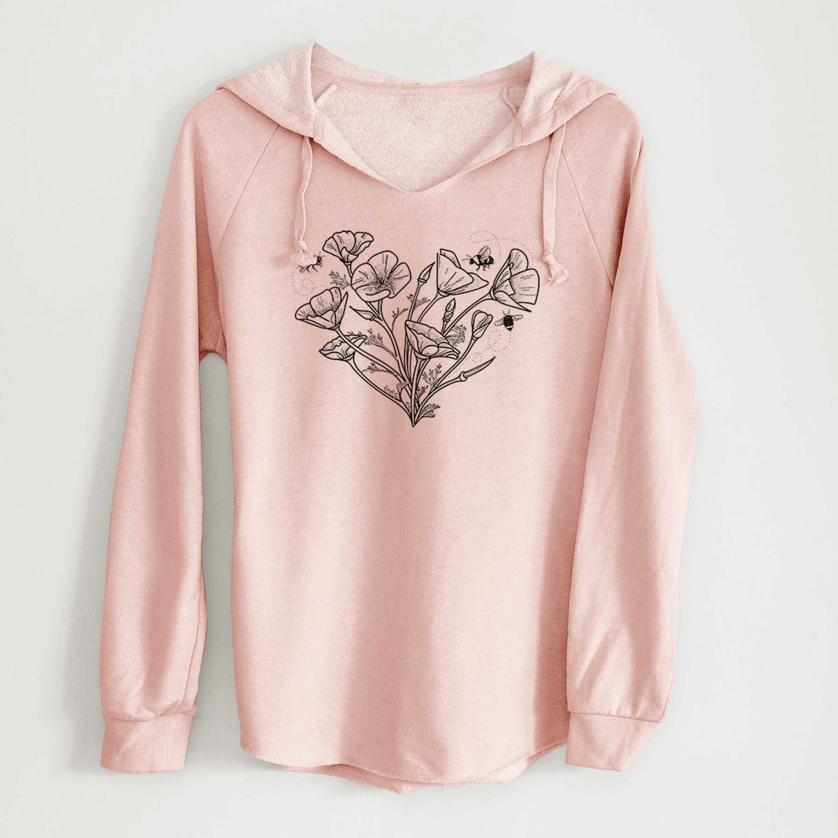 Blush pink women's Cali Wave hooded sweatshirt laid flat, printed with a black ink line drawing of California poppies arranged in a heart shape, with small bees.