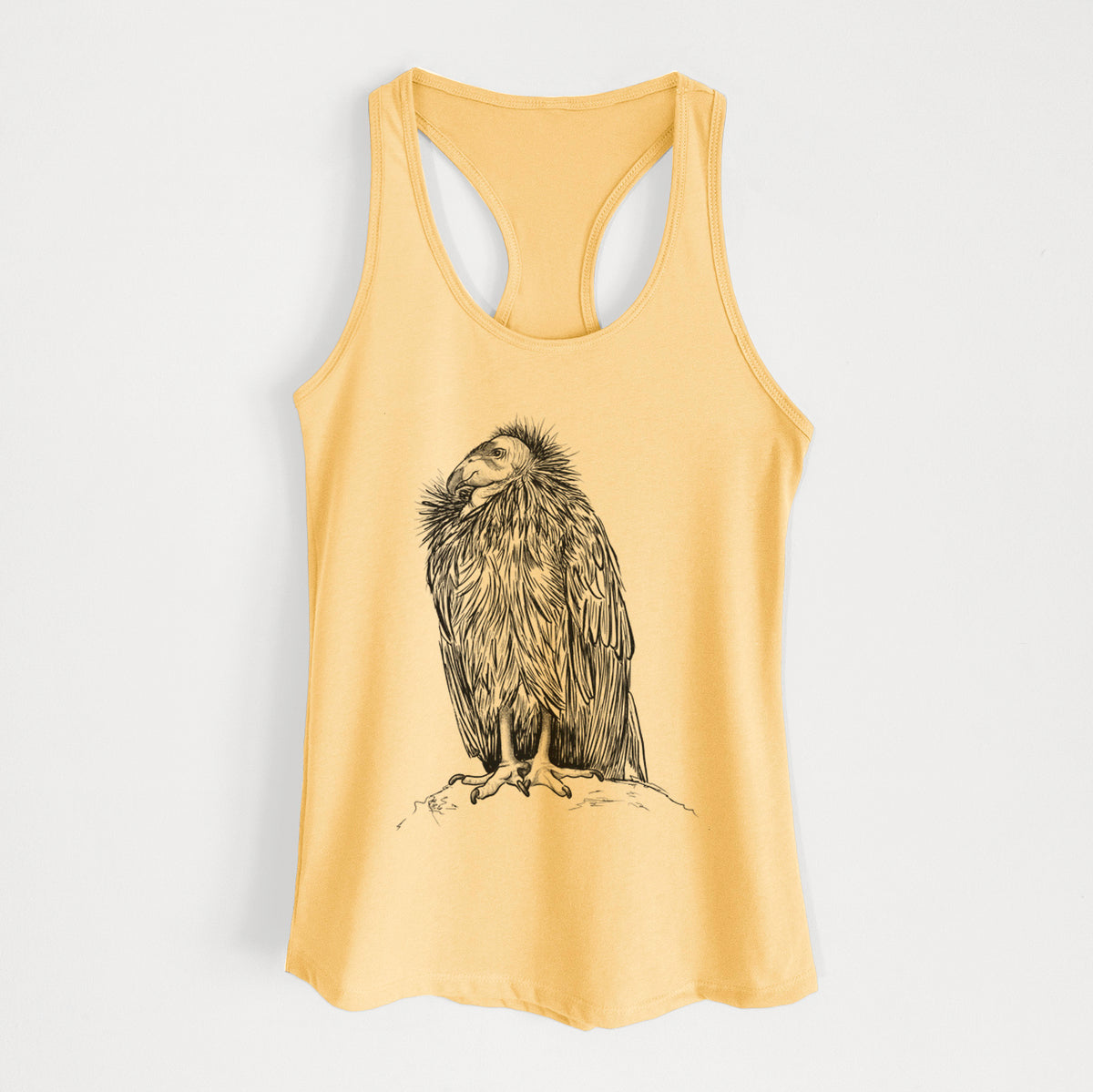 Banana cream women's racerback tank top laid flat, printed with a detailed black ink illustration of a California condor perched with folded wings.