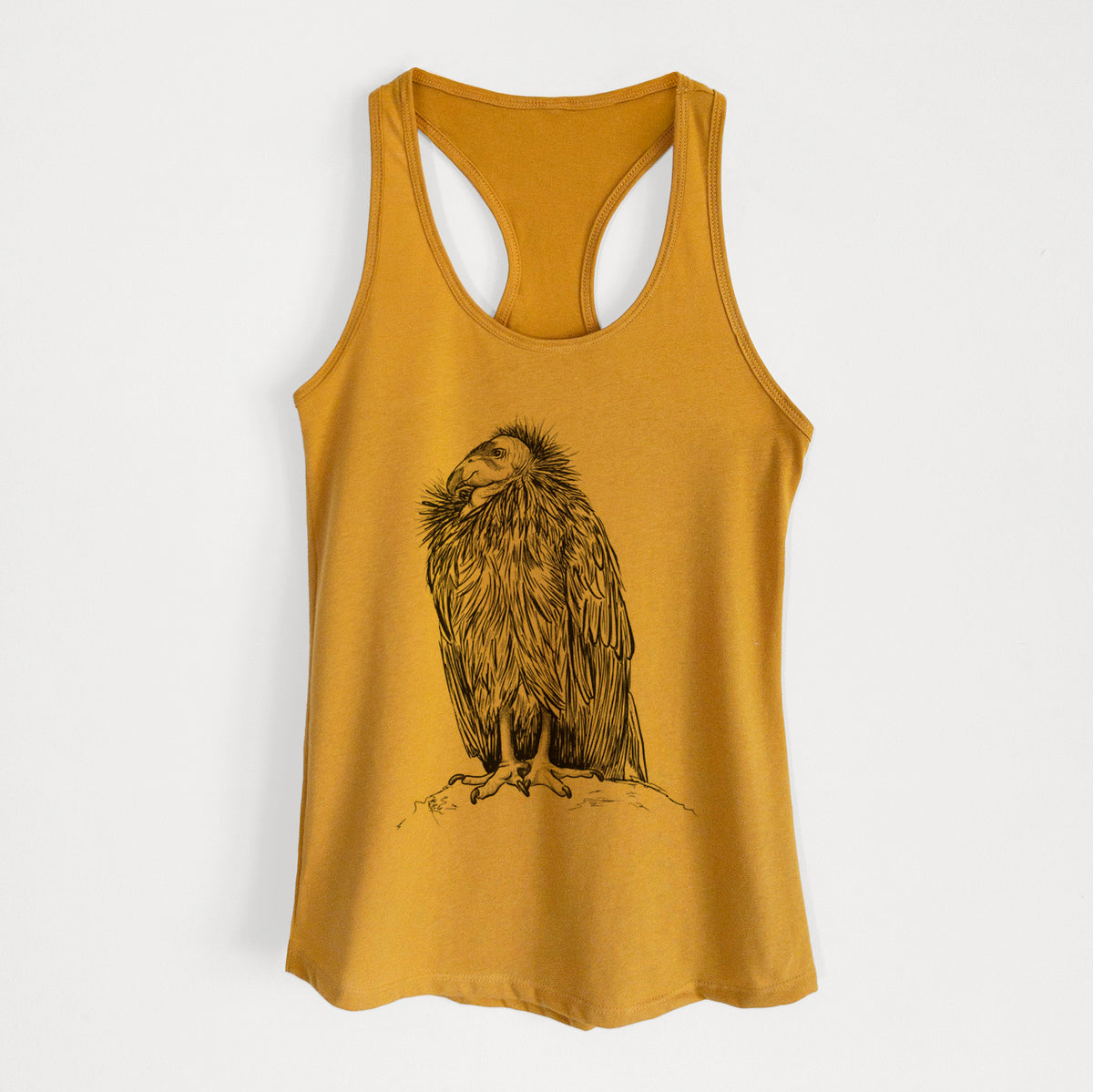 Gold women's racerback tank top laid flat, printed with a detailed black ink illustration of a California condor perched with folded wings.
