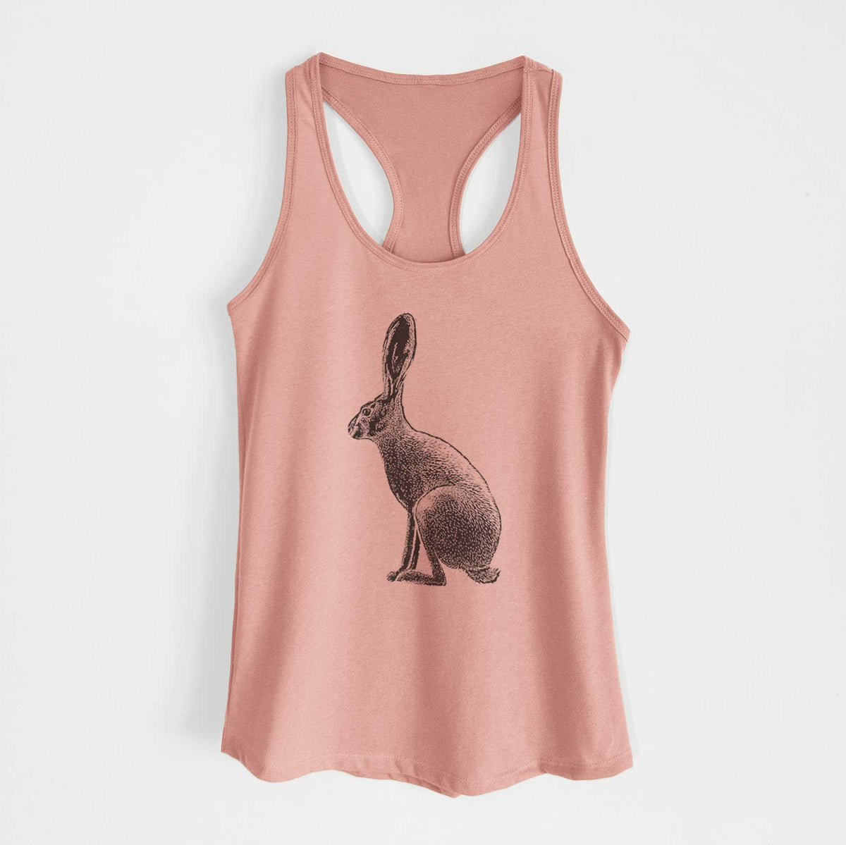 Desert pink women's racerback tank top laid flat, printed with a detailed black ink illustration of a black-tailed jackrabbit sitting in profile with tall ears.