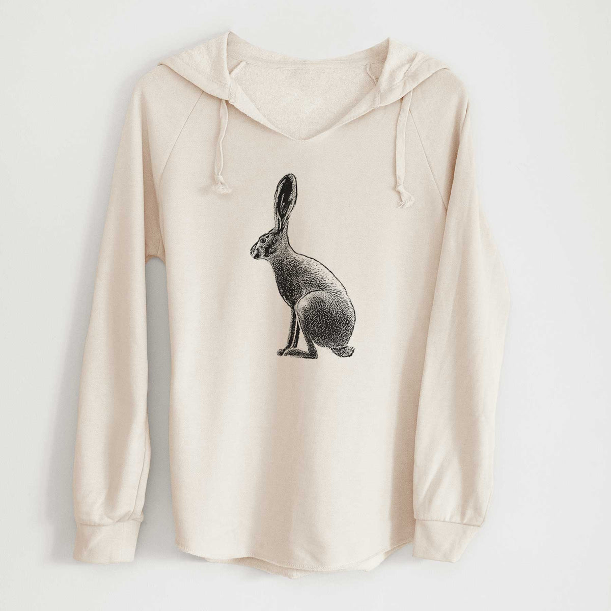 Bone cream women's Cali Wave hooded sweatshirt laid flat, printed with a detailed black ink illustration of a black-tailed jackrabbit sitting in profile with tall ears.