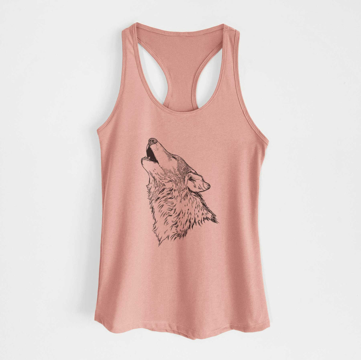 Desert pink women's racerback tank top laid flat, printed with a detailed black ink illustration of a grey wolf's head and shoulders, howling upward.