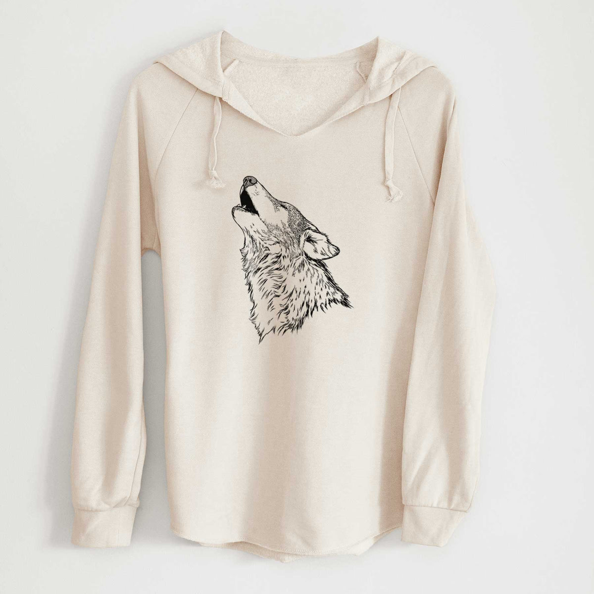 Bone cream women's Cali Wave hooded sweatshirt laid flat, printed with a detailed black ink illustration of a grey wolf's head and shoulders, howling upward.