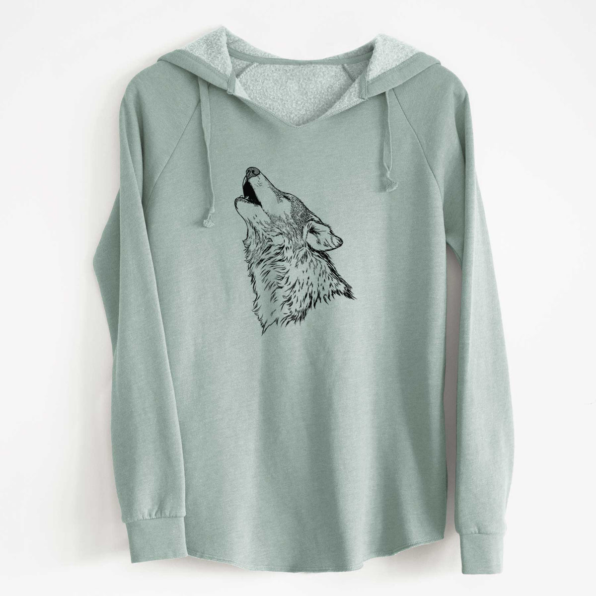 Sage green women's Cali Wave hooded sweatshirt laid flat, printed with a detailed black ink illustration of a grey wolf's head and shoulders, howling upward.