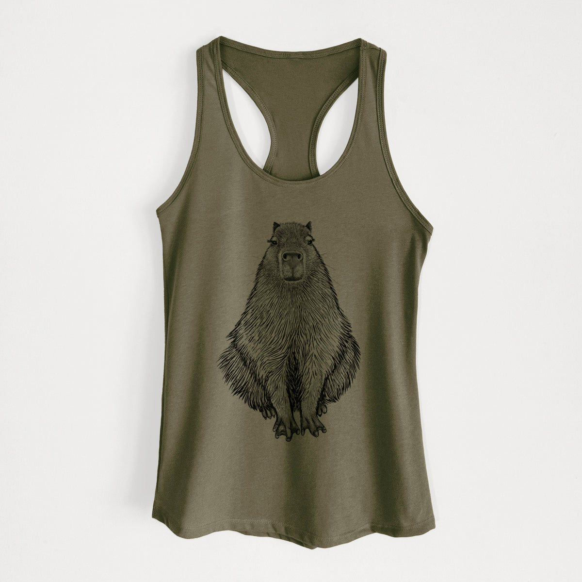Military green women's racerback tank top laid flat, printed with a detailed black ink illustration of a capybara sitting and facing forward.