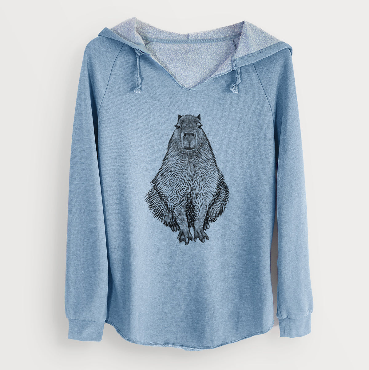 Misty blue women's Cali Wave hooded sweatshirt laid flat, printed with a detailed black ink illustration of a capybara sitting and facing forward.