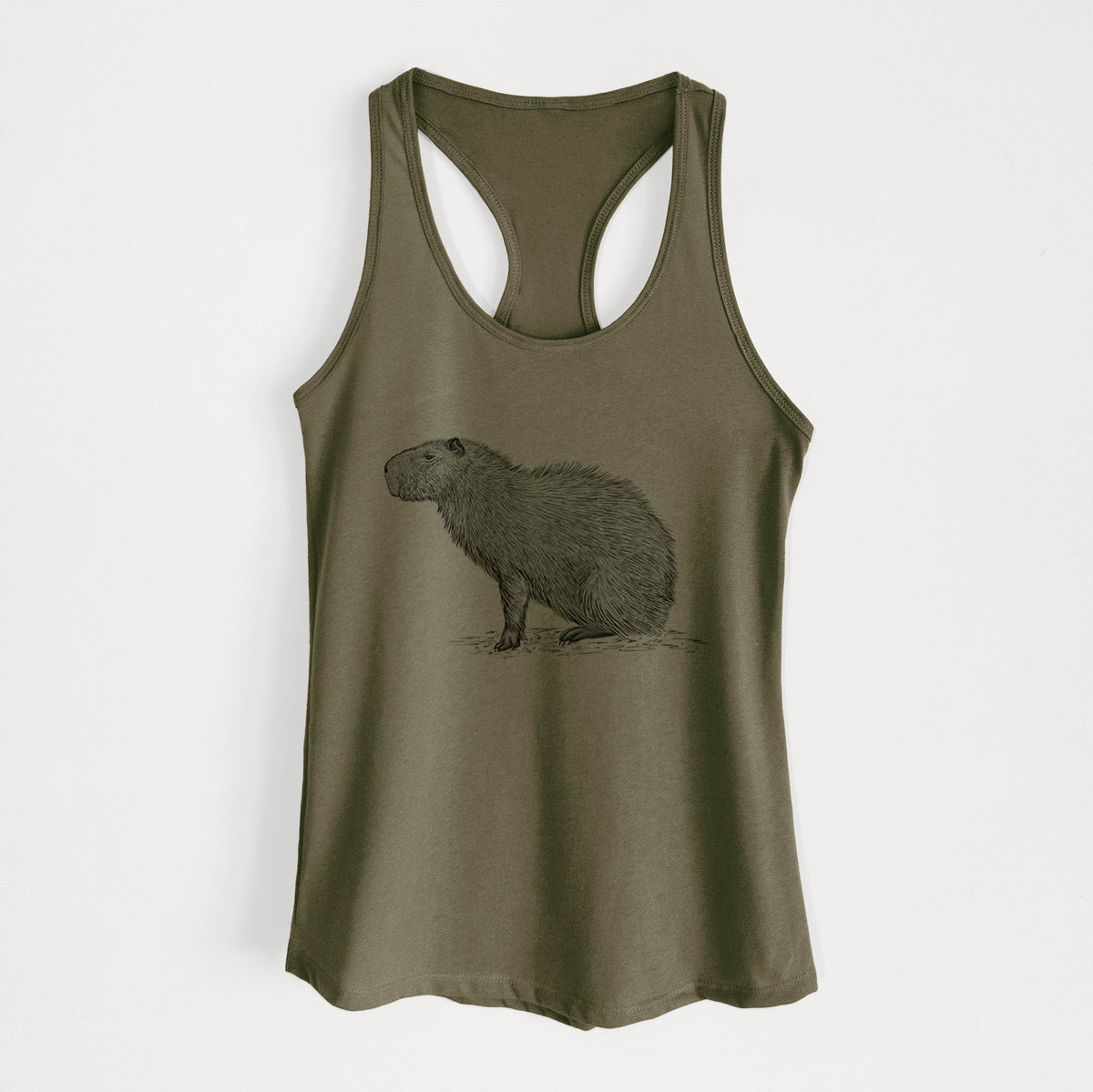 Military green women's racerback tank top laid flat, printed with a detailed black ink illustration of a capybara standing in profile.