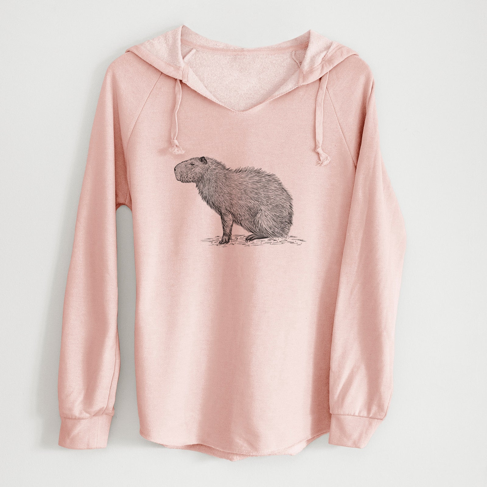 Sage green women's Cali Wave hooded sweatshirt laid flat, printed with a detailed black ink illustration of a capybara standing in profile.