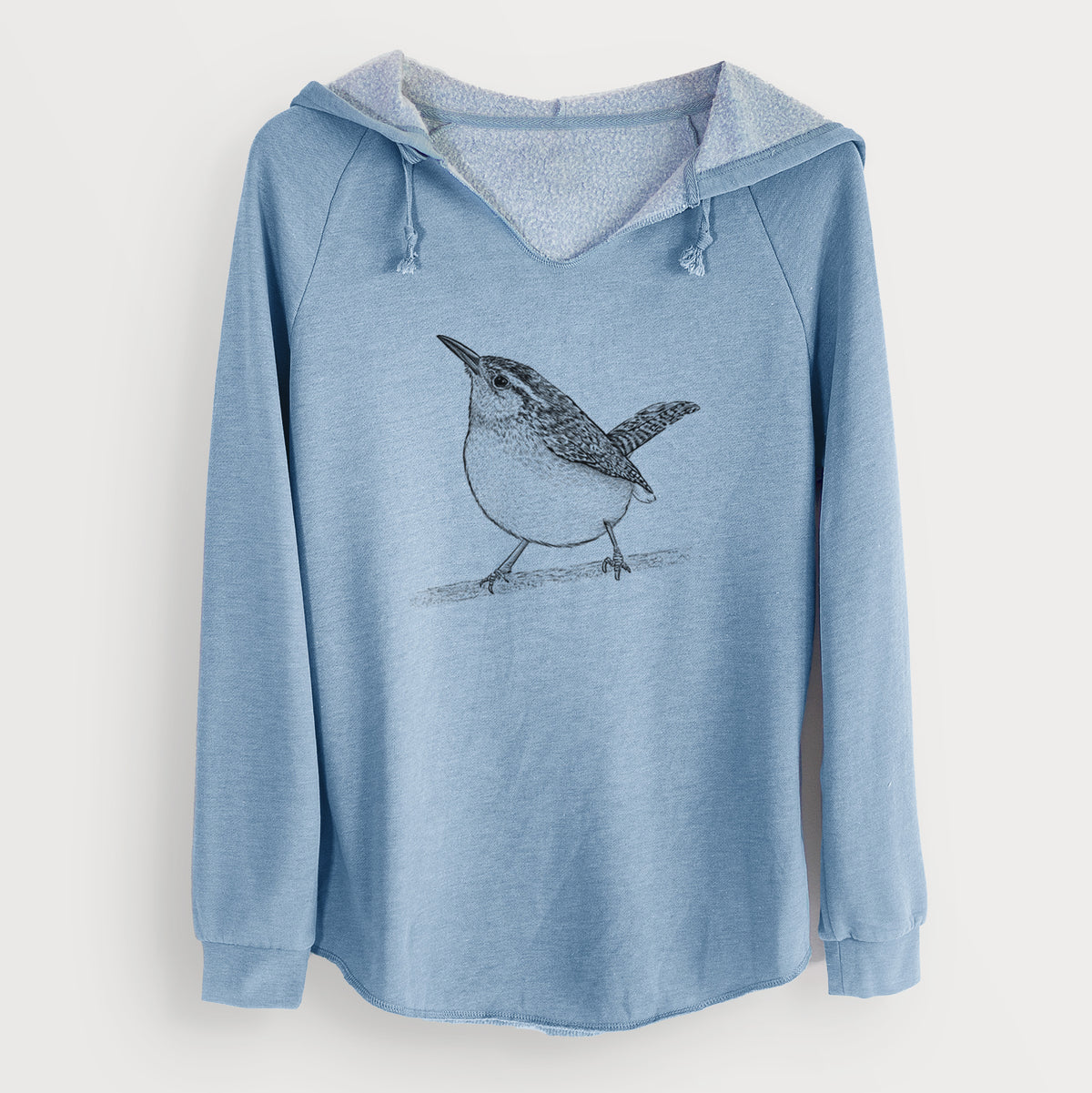 Misty blue women's Cali Wave hooded sweatshirt laid flat, printed with a detailed black ink sketch of a Carolina wren perched on a branch with its tail raised.