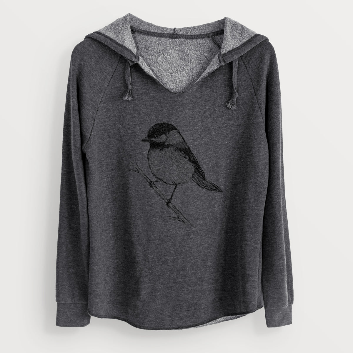 Charcoal grey women's Cali Wave hooded sweatshirt laid flat, printed with a detailed black ink sketch of a black-capped chickadee perched on a branch.