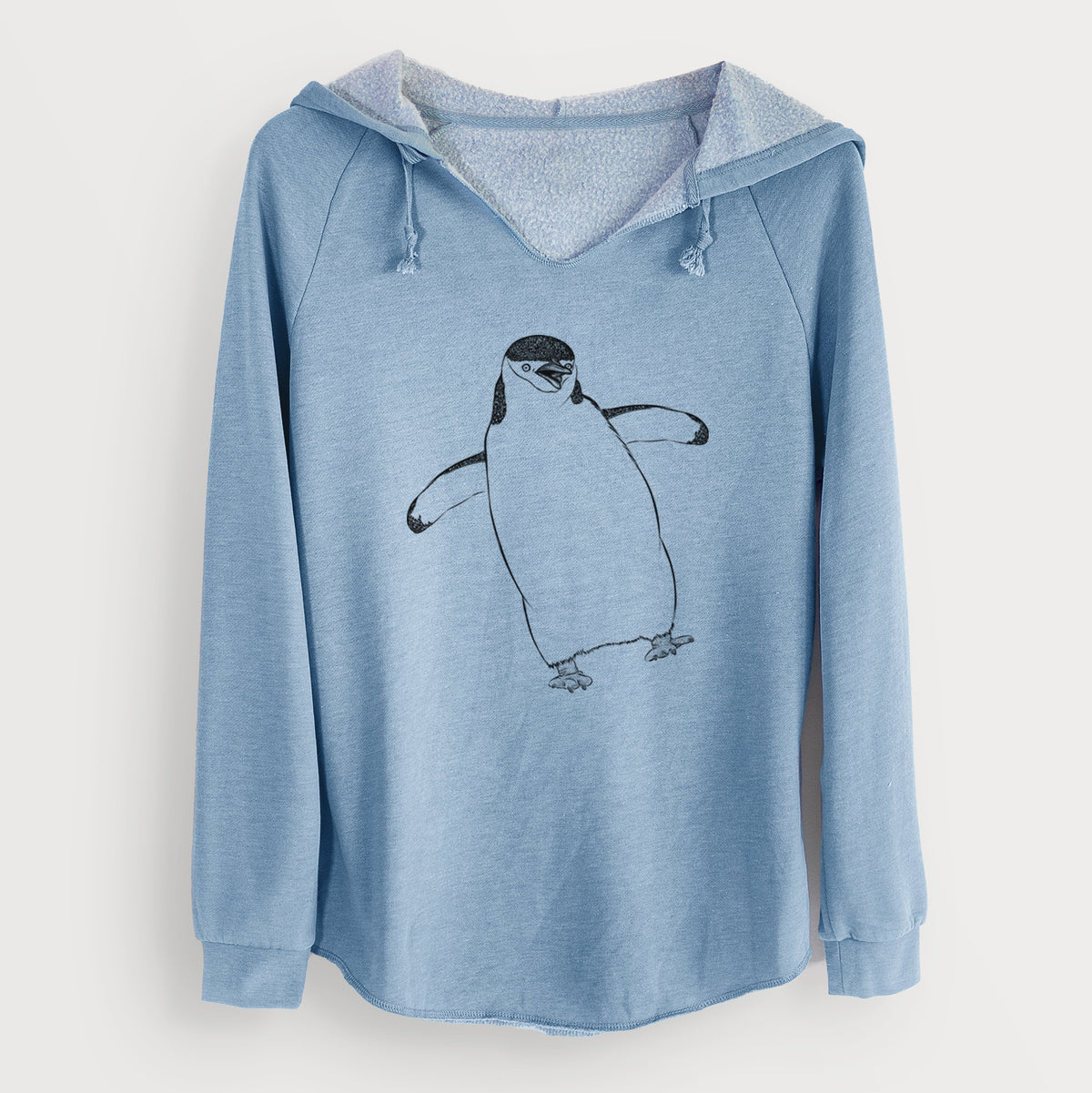 Misty blue women's Cali Wave hooded sweatshirt laid flat, printed with a black ink illustration of a chinstrap penguin standing with its flippers out.