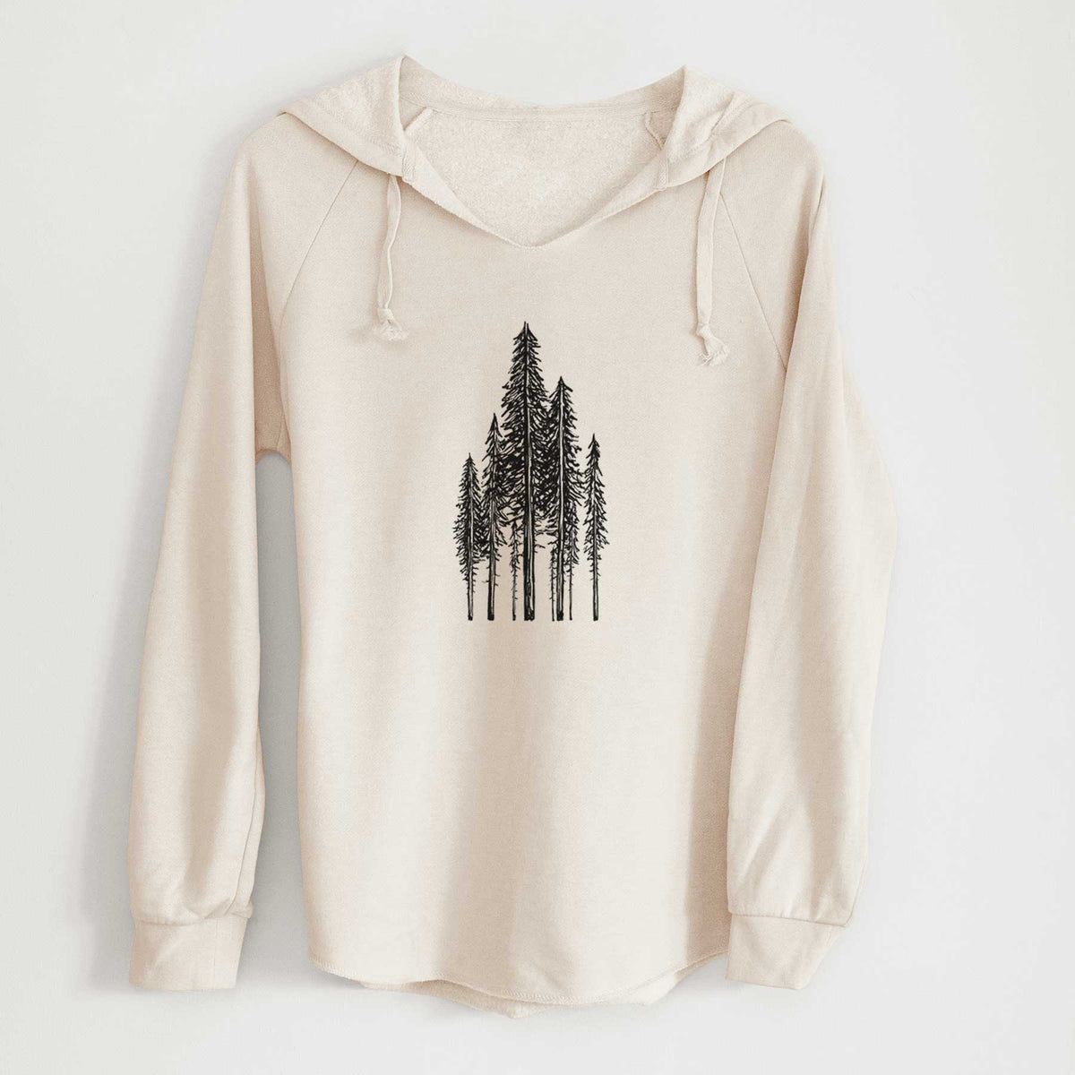 Bone cream women's Cali Wave hooded sweatshirt laid flat, printed with a black ink illustration of a stand of tall coastal redwood trees with slender trunks and layered branches.