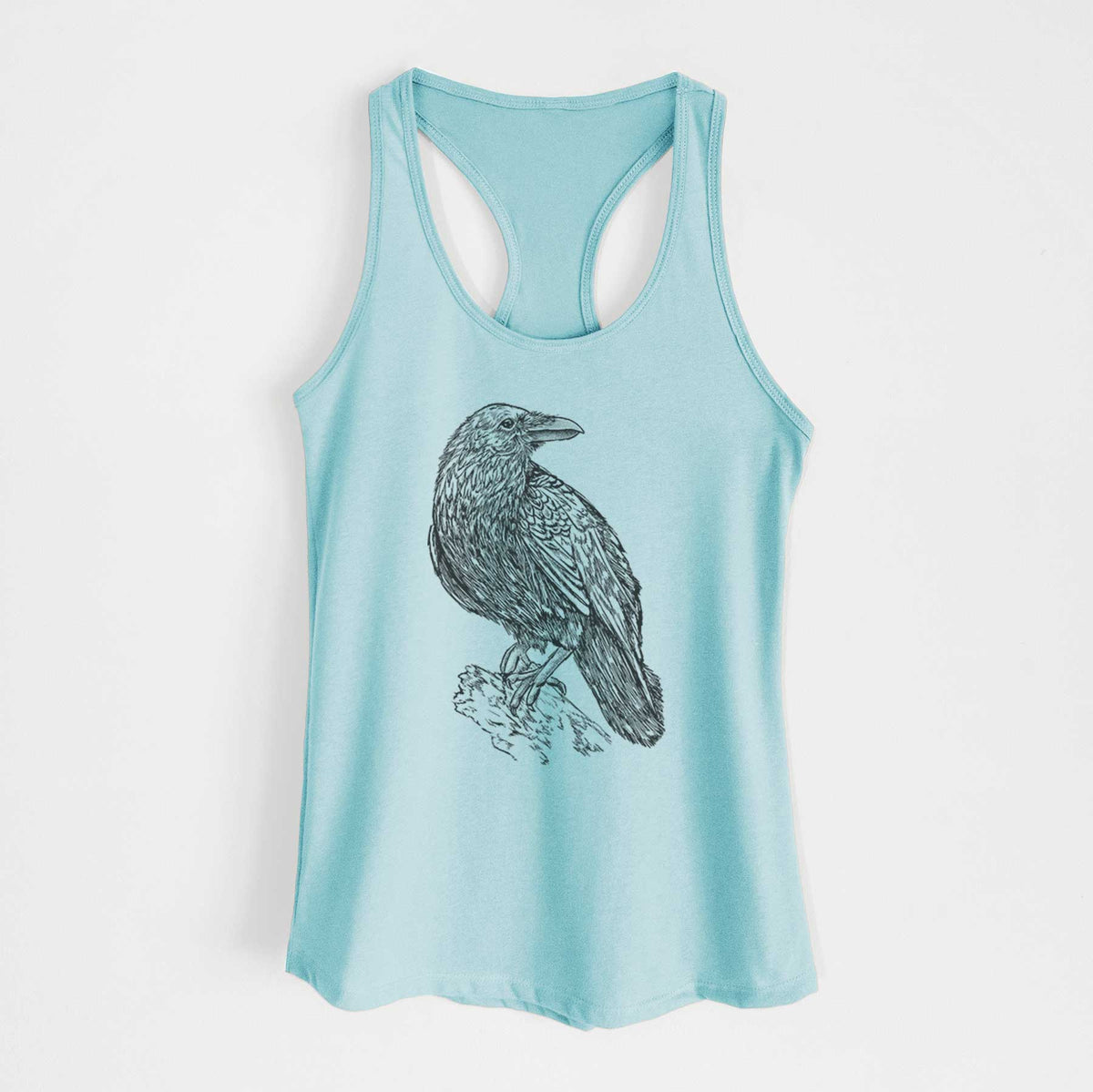 Cancun blue women's racerback tank top laid flat, printed with a detailed black ink sketch of a common raven perched on a rock.