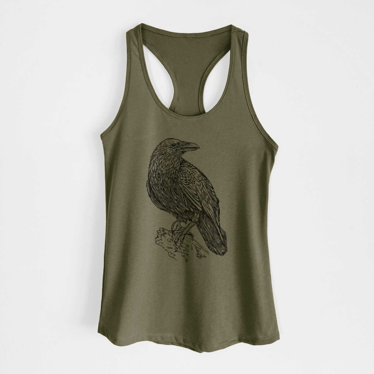Military green women's racerback tank top laid flat, printed with a detailed black ink sketch of a common raven perched on a rock.