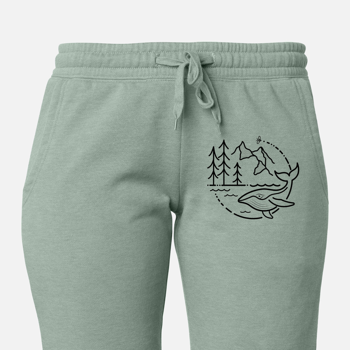 Front of sage green Cali Wave sweatpants, printed with a black line art circle connecting a mountain range, pine trees, a bee and a whale swimming in ocean waves on the leg.