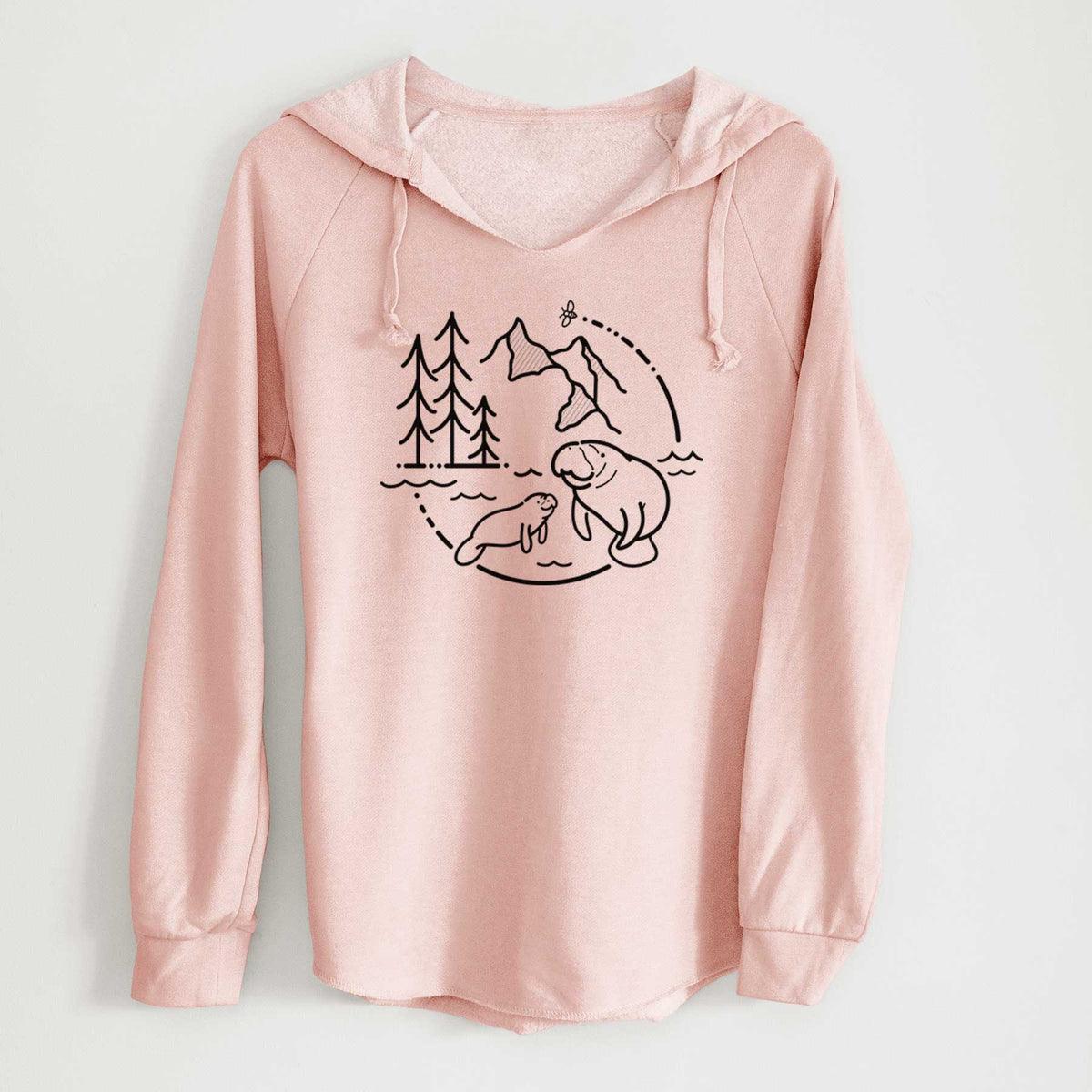 Blush pink women's Cali Wave hooded sweatshirt laid flat, printed with a black line art circle connecting pine trees, mountains, a bee and two manatees swimming in water.