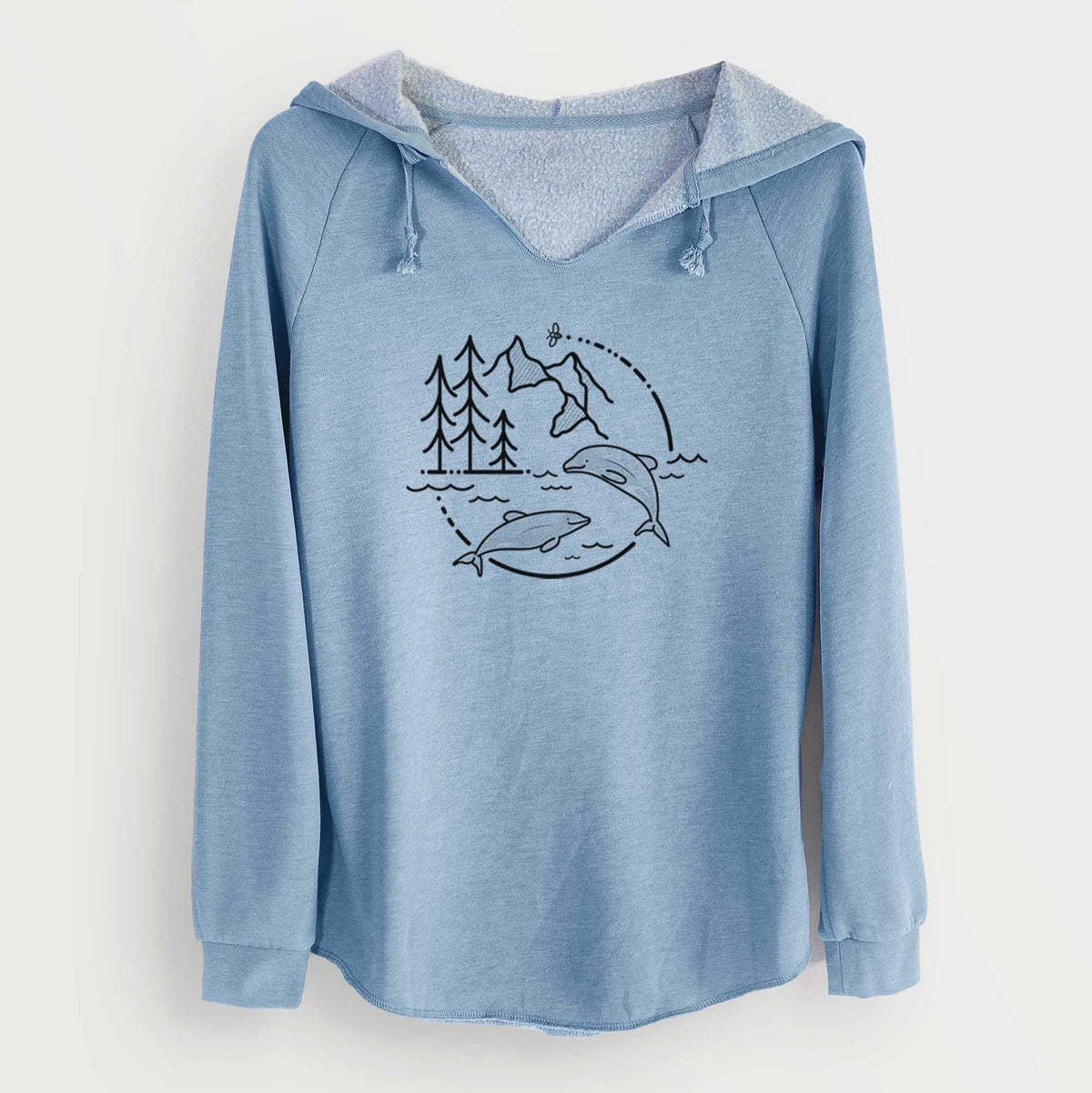 Misty blue women's Cali Wave hooded sweatshirt laid flat, printed with a black line art circle connecting pine trees, mountains, a bee and two Maui dolphins leaping from the waves.