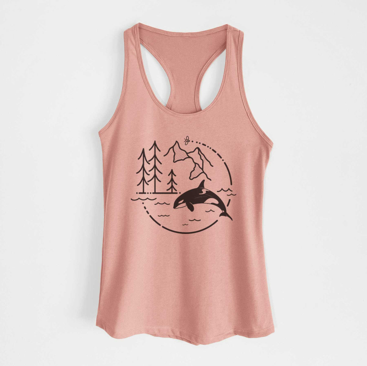 Desert pink women's racerback tank top laid flat, printed with a black line art circle connecting pine trees, mountains, a bee and an orca leaping from ocean waves.