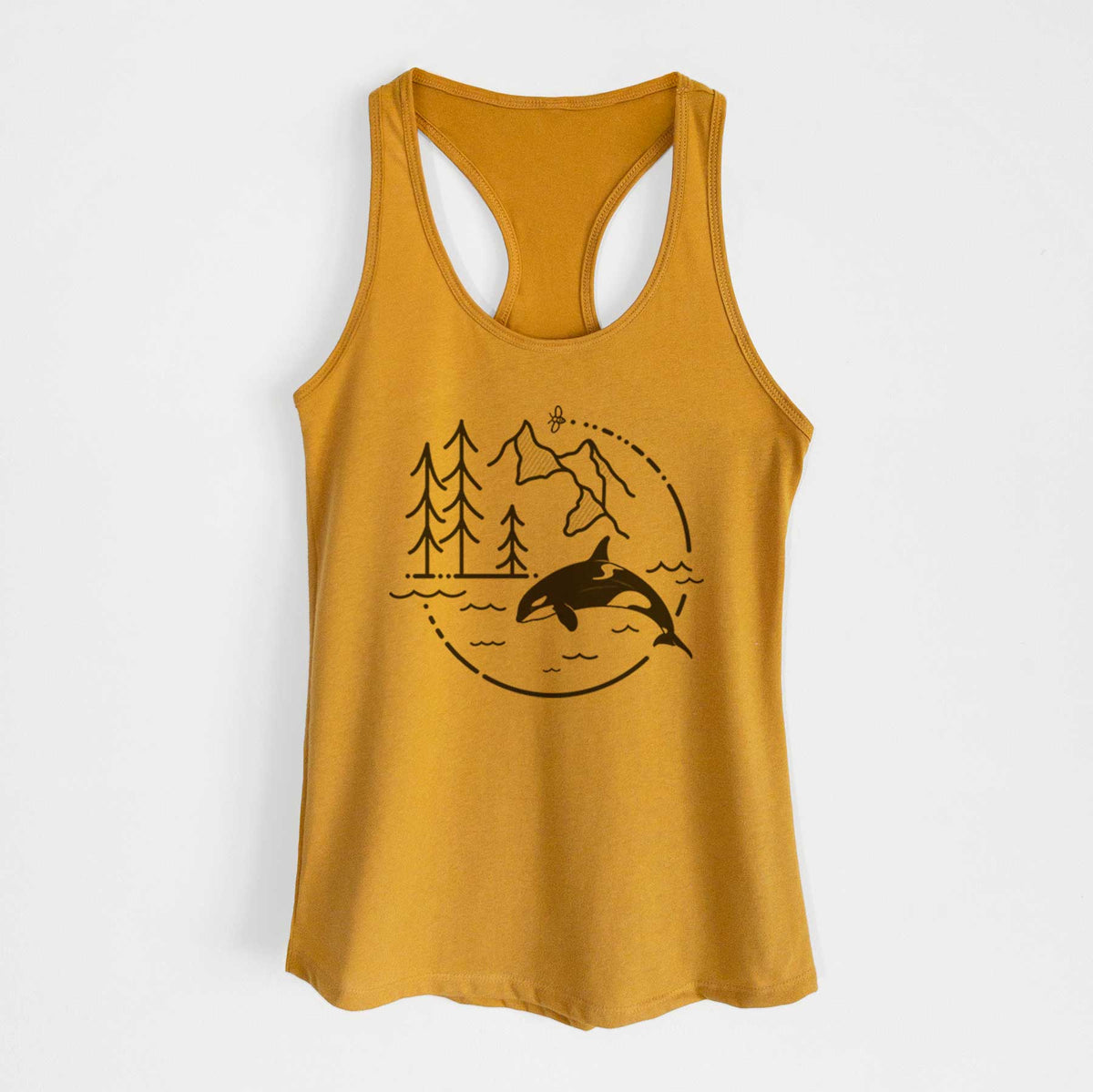 Gold women's racerback tank top laid flat, printed with a black line art circle connecting pine trees, mountains, a bee and an orca leaping from ocean waves.