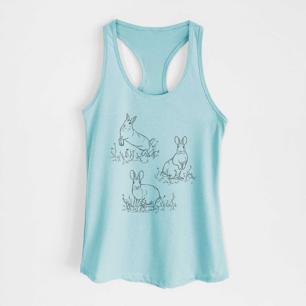 Cancun blue women's racerback tank top laid flat, printed with a black ink illustration of three cottontail rabbits among grass and flowers.