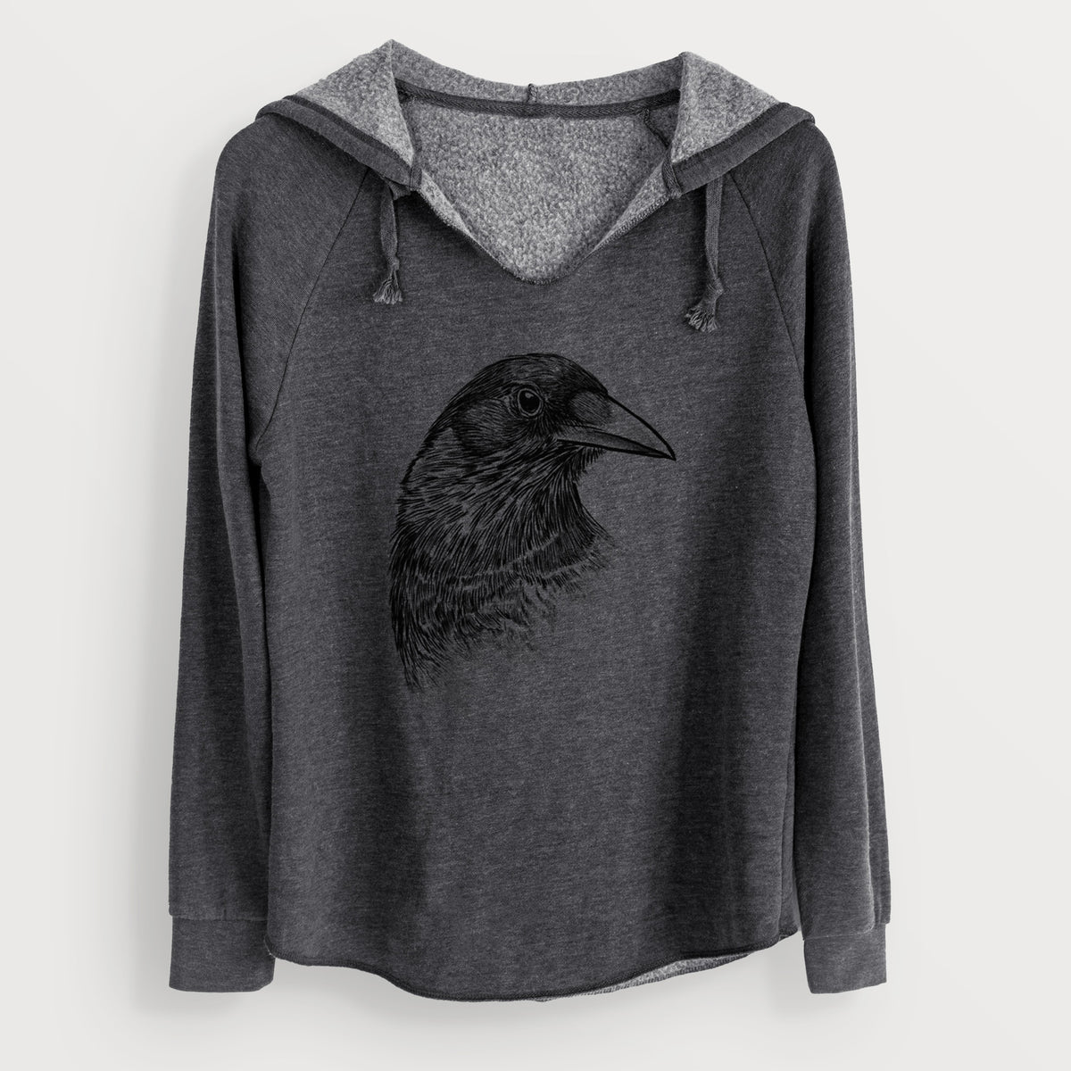 Charcoal grey women's Cali Wave hooded sweatshirt laid flat, printed with a detailed black ink portrait of a crow's head in profile.