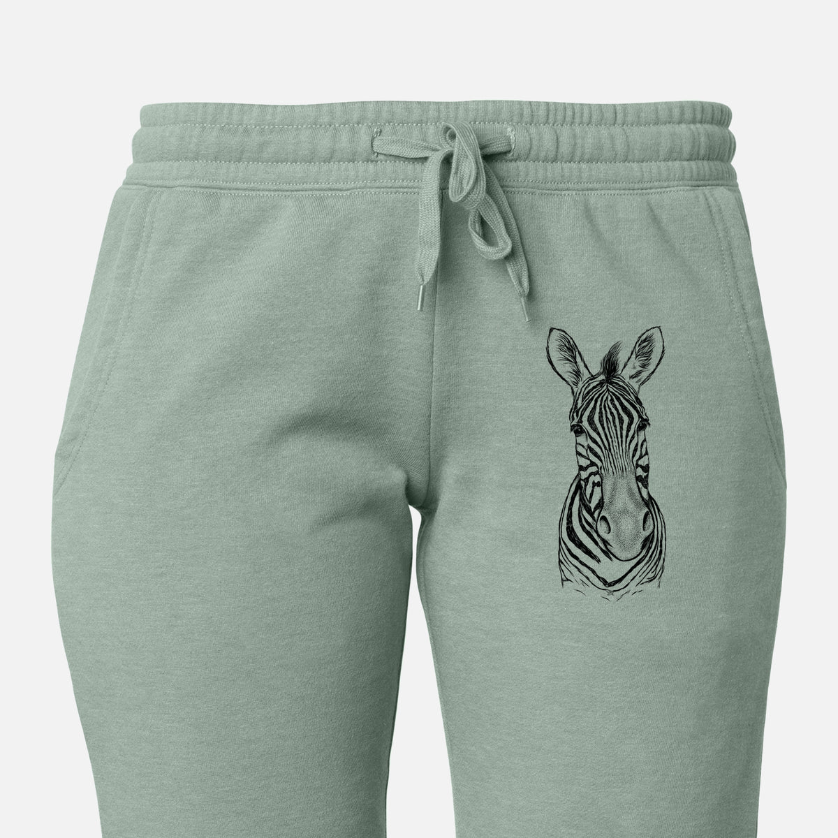 Front of sage green Cali Wave sweatpants, printed with a detailed black ink portrait of a Damara zebra facing forward on the leg.