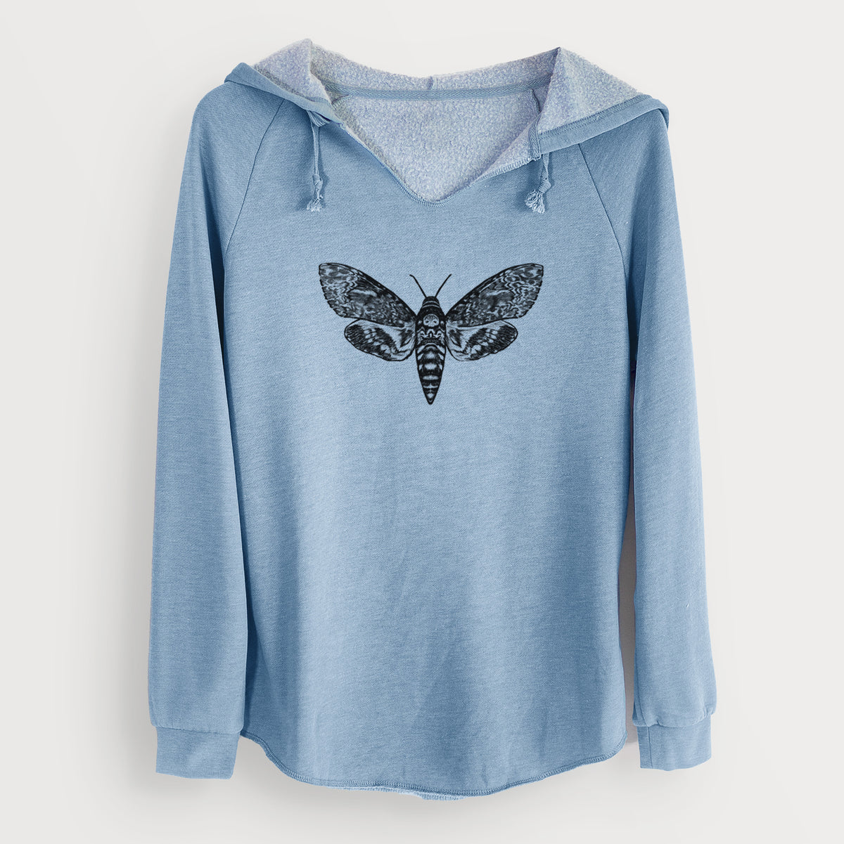 Misty blue women's Cali Wave hooded sweatshirt laid flat, printed with a detailed black ink illustration of a death's-head hawkmoth with its wings spread.