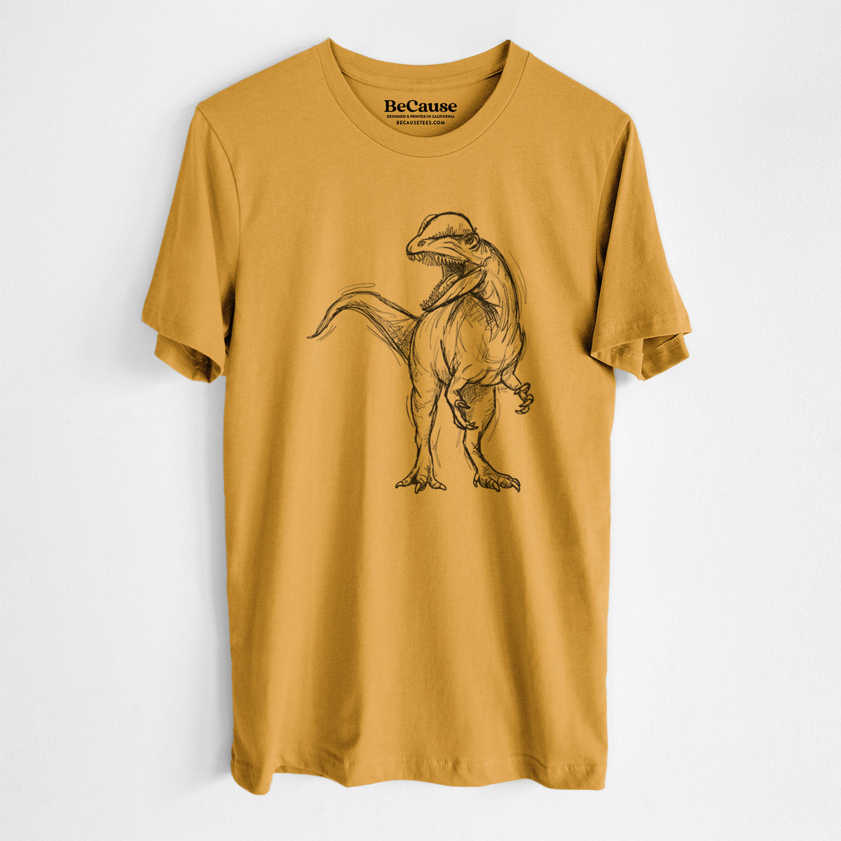 Mustard yellow lightweight cotton t-shirt laid flat, printed with a black ink illustration of a Dilophosaurus with its neck frill, walking.