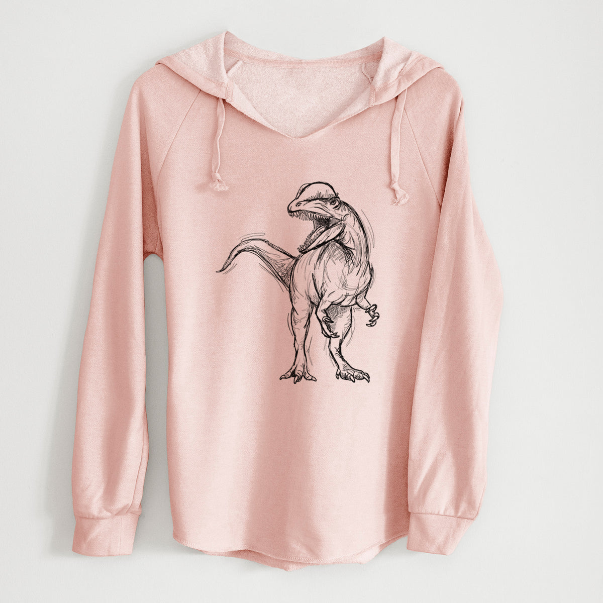 Blush pink women's Cali Wave hooded sweatshirt laid flat, printed with a black ink illustration of a Dilophosaurus with its neck frill, walking.