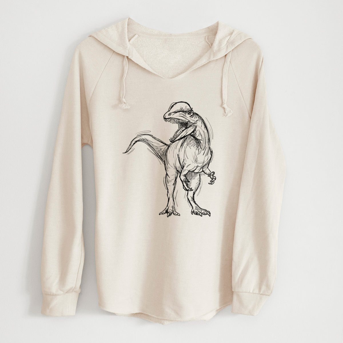 Bone cream women's Cali Wave hooded sweatshirt laid flat, printed with a black ink illustration of a Dilophosaurus with its neck frill, walking.