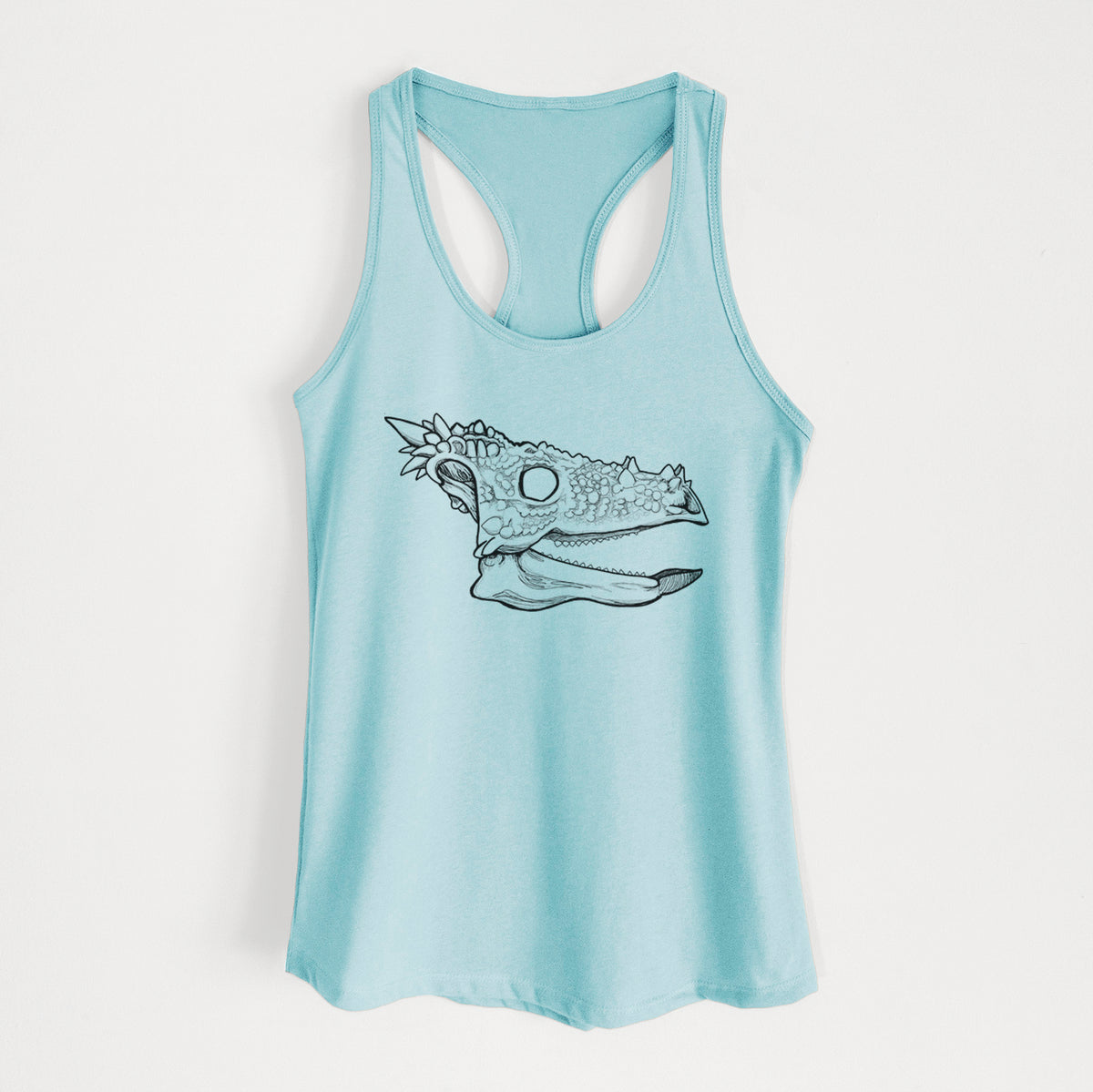 Cancun blue women's racerback tank top laid flat, printed with a black ink illustration of a spiky Dracorex dinosaur skull.