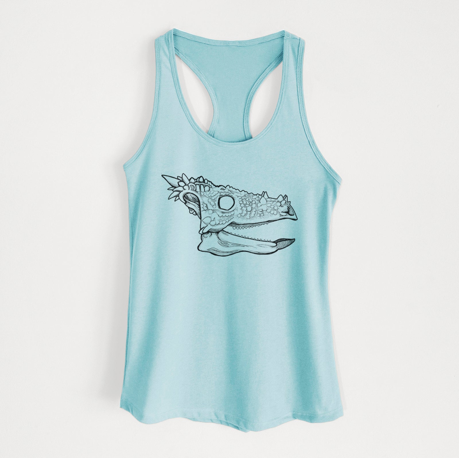 Banana cream women's racerback tank top laid flat, printed with a black ink illustration of a spiky Dracorex dinosaur skull.