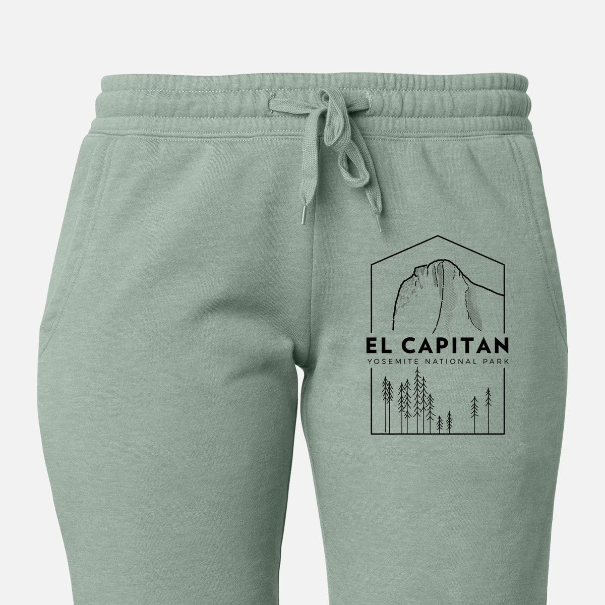Front of sage green Cali Wave sweatpants, printed with a black line art badge of El Capitan rising above a pine forest, with the words El Capitan, Yosemite National Park on the leg.