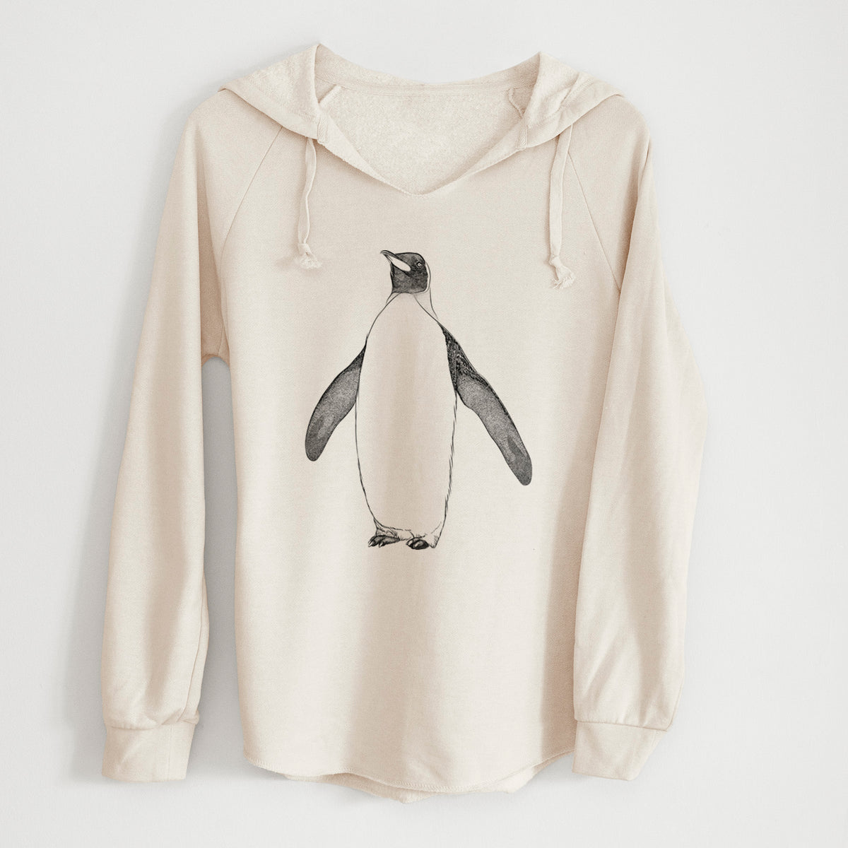 Bone cream women's Cali Wave hooded sweatshirt laid flat, printed with a black ink illustration of an emperor penguin standing.