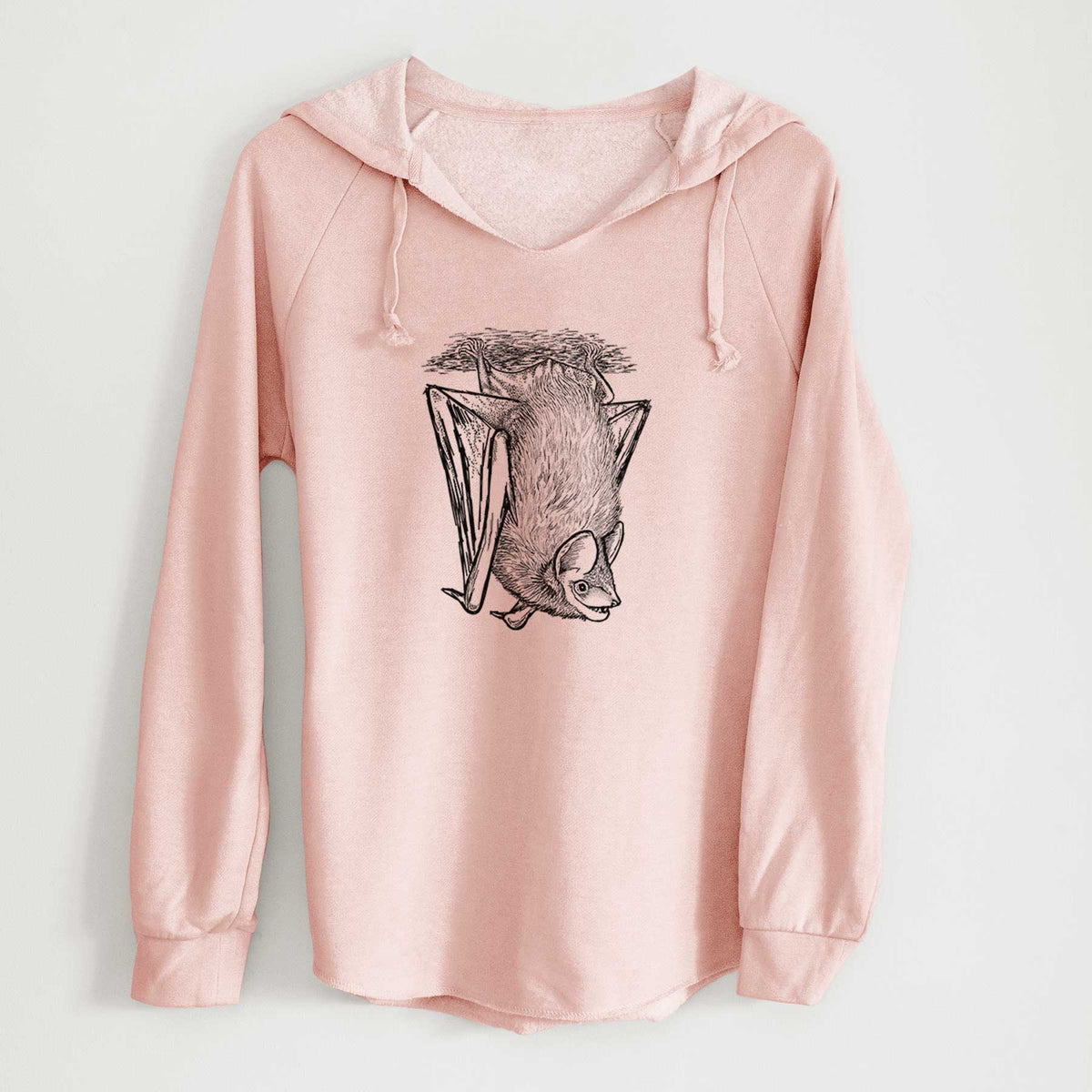 Blush pink women's Cali Wave hooded sweatshirt laid flat, printed with a detailed black ink illustration of a big brown bat hanging upside down.