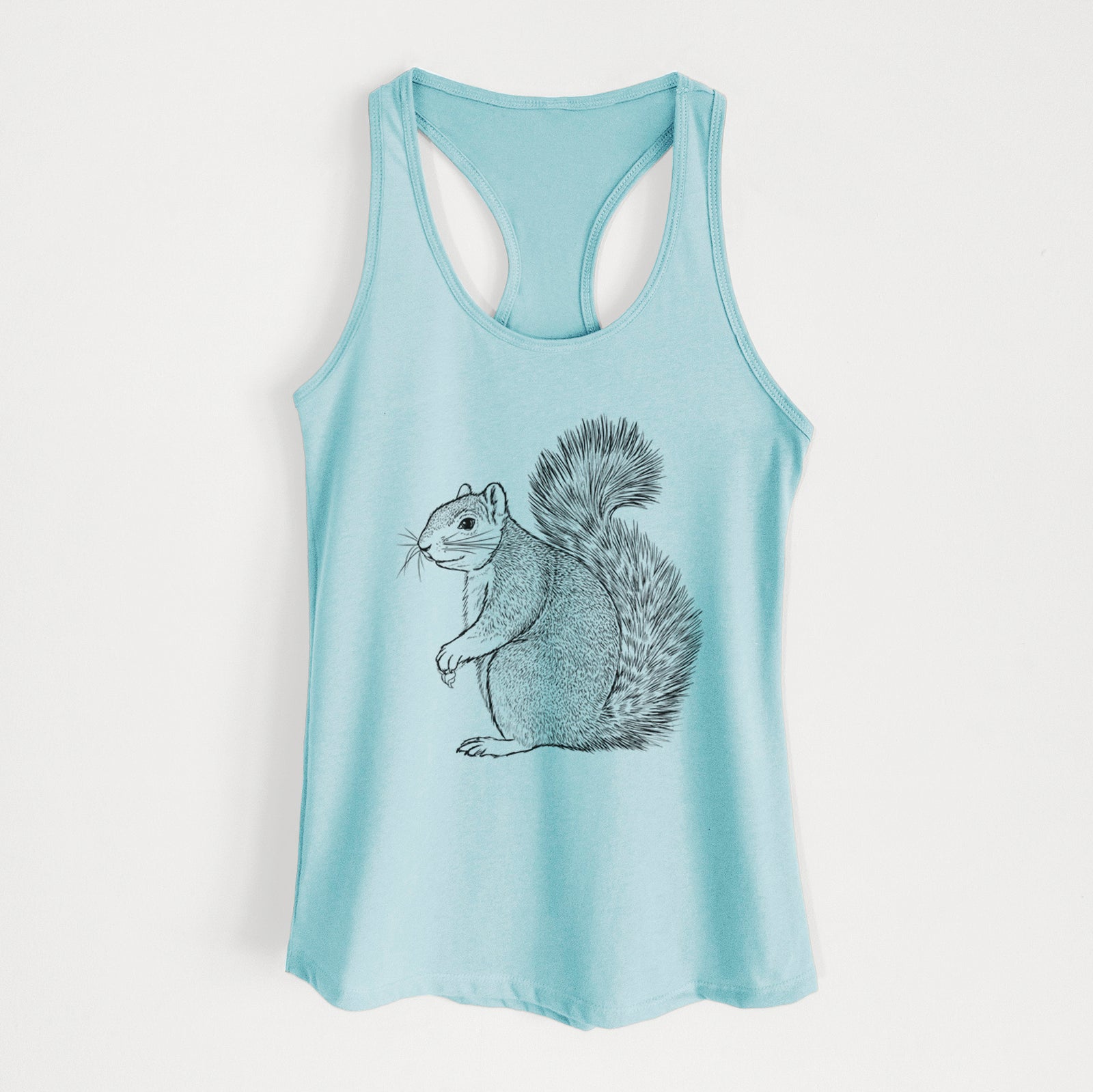 Banana cream women's racerback tank top laid flat, printed with a detailed black ink illustration of a fox squirrel sitting with a bushy tail.