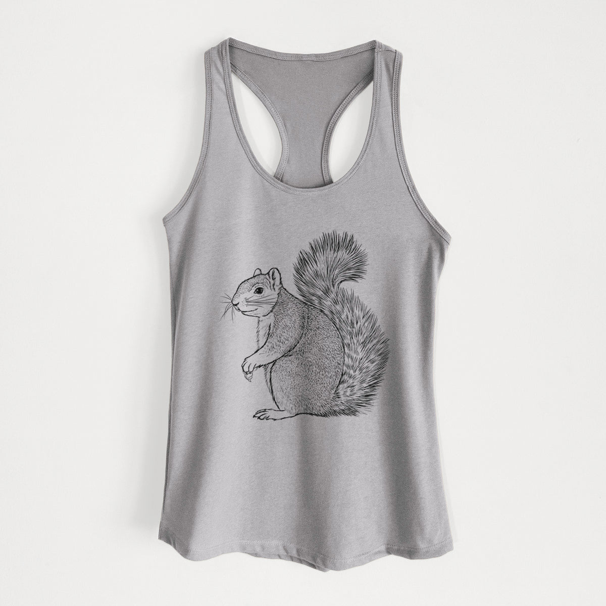 Heather grey women's racerback tank top laid flat, printed with a detailed black ink illustration of a fox squirrel sitting with a bushy tail.
