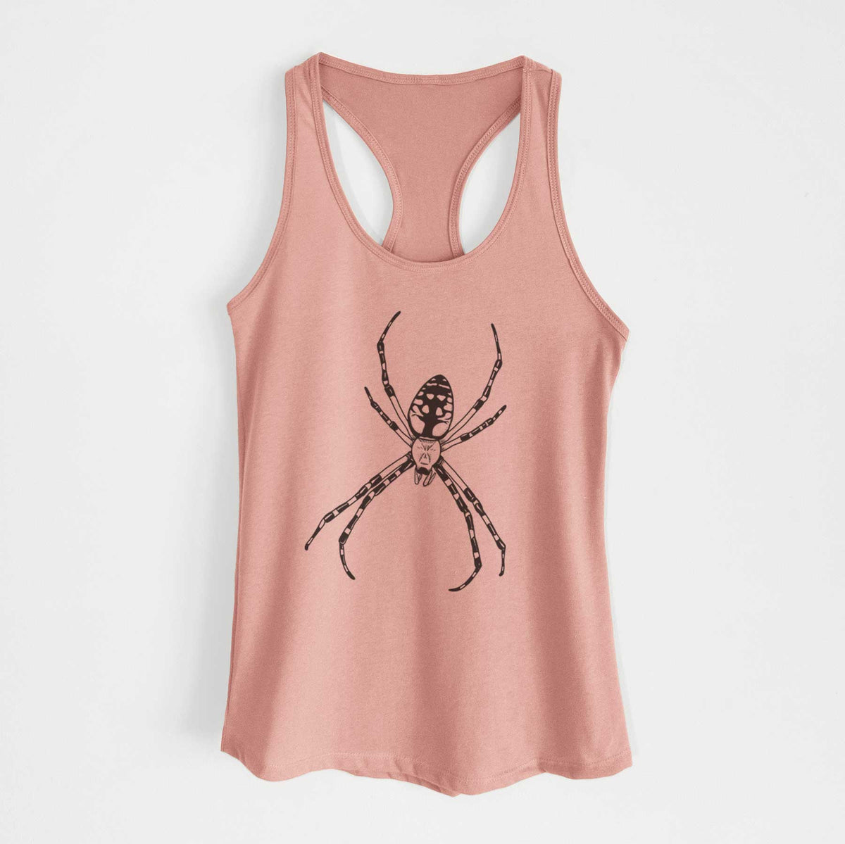 Desert pink women's racerback tank top laid flat, printed with a detailed black ink illustration of a garden spider with long striped legs.